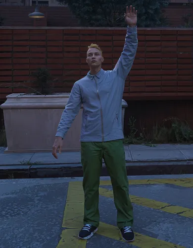 hd upscale , enhanced graphic , better skin , keep the same posture and background,a man waves to the side in a city street,hands up,a pedestrian,dayz,levitating,levitation,raised hands,pedestrian,ymc