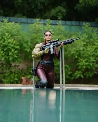 girl with a gun,girl with gun,woman holding gun,pool cleaning,cosplay image,water gun,female swimmer,widowmaker,hard woman,super heroine,huntress,female warrior,swordswoman,shooting sports,chetna sabharwal,airsoft,rifle,dug-out pool,greta oto,cosplayer