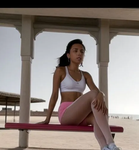 The Moroccan girl sits on a bench and looks at the sea.  She wears sneakers, pink tights and a white sports bra.  There are more people walking around the promenade.,shraddha,tinashe,sonakshi,vaanii,i