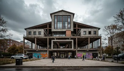 Rustic gymnasium exterior, deconstructed facade, fragmented forms, irregular shapes, bold steel structures, exposed concrete walls, industrial metal cladding, abstract geometric patterns, vibrant graf