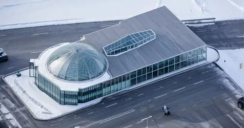 an airplane is on a runway with a very tall building,macewan,globen,toronto city hall,kettunen center,safdie,darmstadtium,Photography,General,Realistic