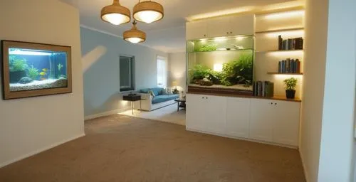 classic style sitting room with wall to wall carpet, wall cabinet with see through fish tank and shelves on the side looking into informal living area with sofa and side table ,mudroom,hallway space,f