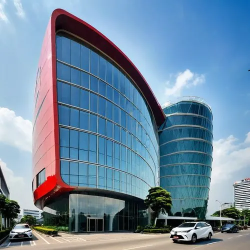 A LUXURIOUS TOYOTA MOTORS DEALER, TWO STOREYS, SURABAYA, STREET JUNCTION, RED CRESCENT LOGO, PERFORATED BLACK METALS BUILDING COVER, LARGE PARKING AREA AT FRONT, LARGE STEEL COLLONADE , GOLDEN LINING,