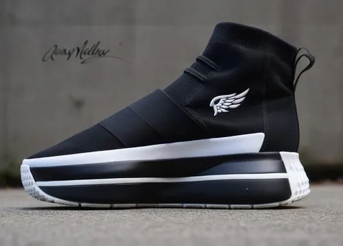 Sock upper sneaker with canvas heel spine, "wing" logo, thick sole, all black with white accent color scheme ,Women's platform sock sneaker black/white ,flints,barons,chukka,forefoot,zanotti,currys,Ph