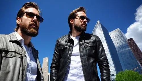 Male, architectural photographer, 30s, casual clothing, denim jeans, black leather jacket, white shirt, brown hair, glasses, beard, holding camera, standing, looking up, Denver cityscape, modern skysc