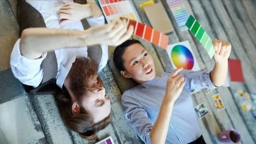 complete floor,several business people surrounding a small rainbow - shaped object,aiesec,intercultural,colori,tricolor,tricolore,colorata