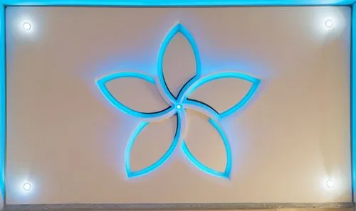 Gypsum decoration in the ceiling of a room with hidden LED lighting the ceiling,a lighted sign with flowers on it and lights,om,fleur de lis,electroluminescent,grameenphone,fanlight,infinity logo for 