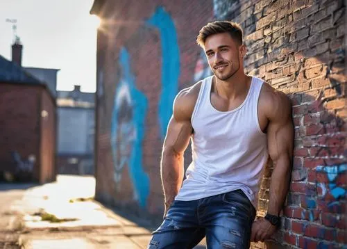 Male, muscular man, 25-30yo, strong jawline, short brown hair, messy styling, bright blue eyes, facial stubble, small nose ring, casual smile, relaxed posture, white tank top, ripped blue jeans, black