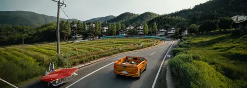 steep mountain pass,tuk tuk,subaru 360,hindustan ambassador,tata nano,piaggio ape,national highway,miniature cars,alpine drive,the pamir highway,2cv,fiat 850,renault trafic,fiat 600,citroen 2cv,mountain highway,tata sumo,car train,mountain pass,racing road