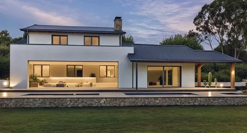 modernism, khaki color, exterior wall, rough stone foundation, large glass windows, sliding doors, minimalist decoration, greenery, succulents, wooden accents, natural texture, warm lighting, afternoo