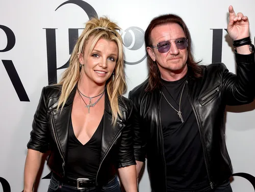 Bono vox and Britney Spears,,singer and actress,poison,rock concert,annemone,prince and princess,artists of stars,rock and roll,rock 'n' roll,rocker,mom and dad,rock n roll,lady rocks,rock'n roll,pare