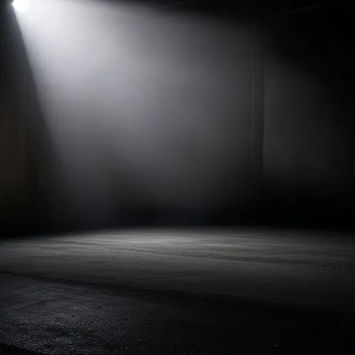 Generate a dark, moody scene where a soft spotlight or beam of light shines from the top left corner, illuminating a small part of the ground in the foreground. The surface is textured, resembling con