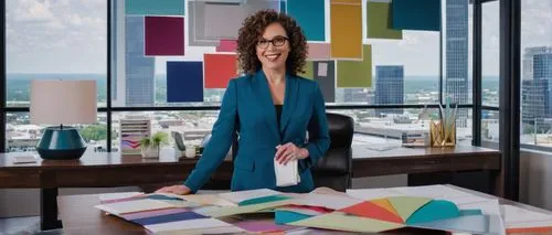 Modern interior designer, St Louis MO, standing, confident pose, professional attire, glasses, curly brown hair, subtle makeup, holding a portfolio, surrounded by 3D models, architectural designs, col