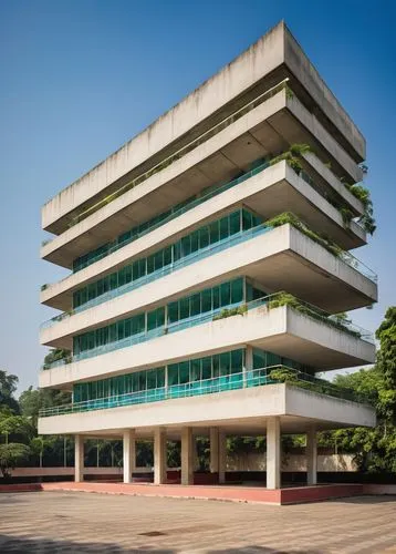 Chandigarh style architecture, modern Indian design, brutalist structure, concrete material, geometric shapes, clean lines, minimalist details, glass façade, steel framework, urban landscape, cityscap