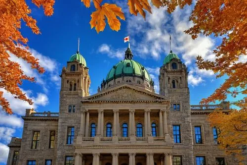 Ontario parliament building, neoclassical architecture, grand dome, symmetrical facade, intricate stone carvings, large columns, ornate details, Canadian flag waving, autumn leaves surrounding, vibran