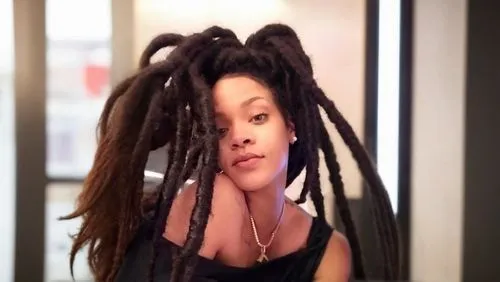 sigourney weave,dreadlocks,dreads,twists,bjork,dread,artificial hair integrations,chaka,rastaman,open locks,black woman,medusa,weave,rasta braids,pot rack,rows,cornrows,tree loc sesame,lo mein,noodle image