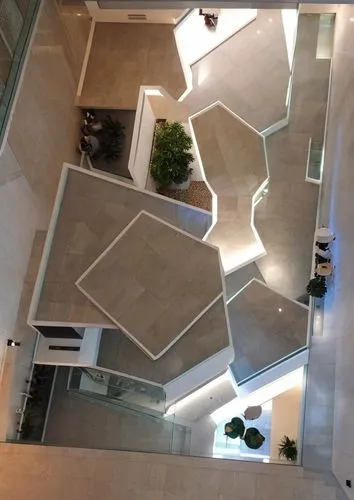 atrium,atriums,lobby,view from above,foyer,associati,hotel lobby,entrance hall,groundfloor,from above,skylights,corian,seidler,cochere,concrete ceiling,outside staircase,safdie,cube house,overhead view,contemporary decor,Photography,General,Realistic