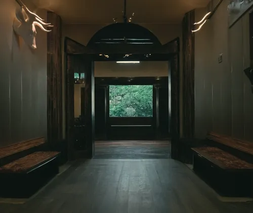 ryokan,japanese-style room,hallway,wooden floor,wood floor,hallway space,hotel hall,empty interior,empty hall,capsule hotel,lodge,dark cabinetry,cabin,attic,interiors,railway carriage,wooden beams,the threshold of the house,corridor,rooms