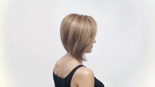 beautiful woman with smooth skin and nice body,a woman is standing back to camera wearing a short, blond hairscut,promax,braide,premaxillae,procollagen,trichotillomania,ferulic