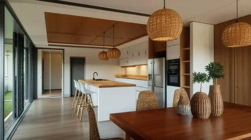 Uma sala de jantar e cozinha, com piso laminado de madeira, detalhes dourados nas prateleiras da cozinha, prateleiras em MDF lacado, o refrigerador prateado.,modern kitchen interior,modern kitchen,kit