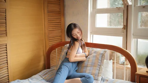 relaxed young girl,girl sitting,the little girl's room,baby room,room newborn,wooden shutters,child is sitting,infant bed,woman sitting,japanese-style room,china massage therapy,girl in a long,window treatment,pregnant girl,little girl reading,open window,soft furniture,girl in bed,baby bed,sleeper chair