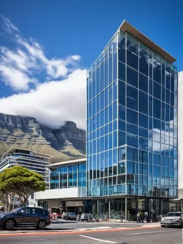 Modern architectural building, Cape Town, South Africa, Table Mountain background, contemporary sleek lines, large glass windows, minimalist decor, steel structure, concrete foundation, urban cityscap