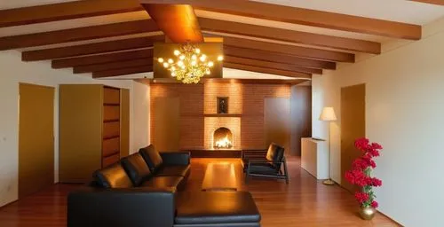 As the sun begins to set, the room transforms into a stunning masterpiece of modern art, with a sleek leather couch and intricate brick fireplace backdrop. The centerpiece of the room is a vibrant vas