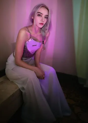 this is a model that is standing next to purple lighting,lilyana,quinceanera,purple dress,kimberlain,purple background,gabsi