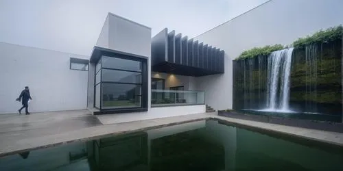 aqua studio,cubic house,cube house,modern house,water wall,modern architecture