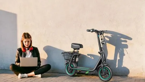 girl with a wheel,cybersitter,scootering,girl at the computer,electric scooter,woman bicycle