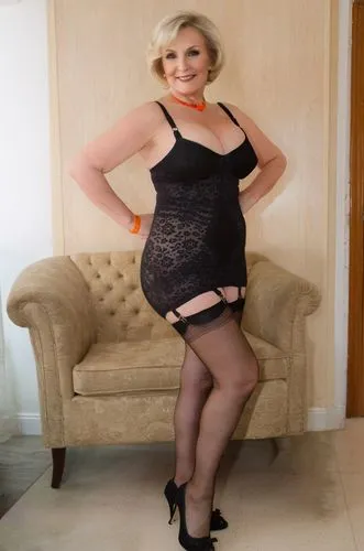 65yo blonde hair milf, short hair, wearing   lace bodysuit and stocking, happy,a women in a black bodysuit posing for a po,shapewear,lbbw,bbw,curvaceous,rosaleen,nylons