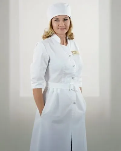 Медсестра в медицинском белом халате В Полный Рост.,a woman is dressed in an uniform while posing for a po,female nurse,chef,chef hat,nurse,kutuzova,chef hats