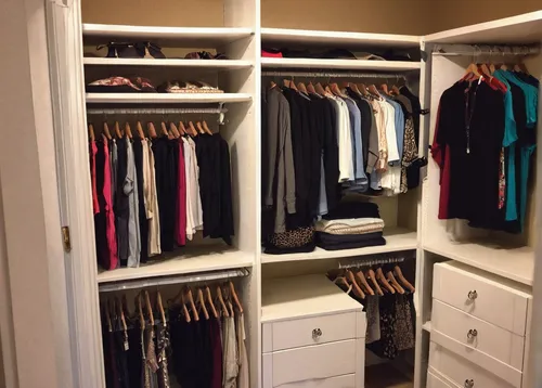 The walk-in closet space in every unit includes 3/4-inch corner shelves and  radius bars at each workable corner of,walk-in closet,women's closet,wardrobe,closet,lisaswardrobe,storage cabinet,armoire,