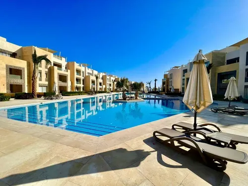 hurghada,outdoor pool,jumeirah,holiday complex,riad,resort,jumeirah beach hotel,cyprus,largest hotel in dubai,hotel complex,swimming pool,beach resort,outdoor furniture,luxury property,madinat,morocco,pool bar,heliopolis,luxury hotel,iberostar