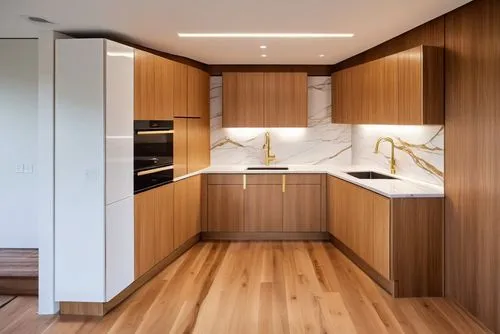 A modern, minimalist kitchen with a central island featuring white vertical paneling and a marble countertop. Four sleek wooden bar stools with curved seats and thin, gold legs are lined up at the isl