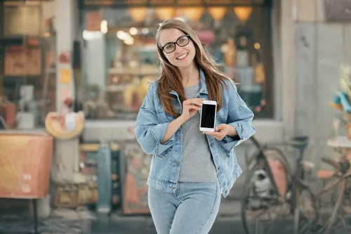 woman holding a smartphone,girl with speech bubble,reading glasses,e-book readers,e-wallet,digital advertising,tablets consumer,alipay,woman eating apple,blonde woman reading a newspaper,mobile phone accessories,payments online,sprint woman,digital data carriers,mobile banking,advertising figure,mobile phone battery,handheld device accessory,e-mobile,mobile application