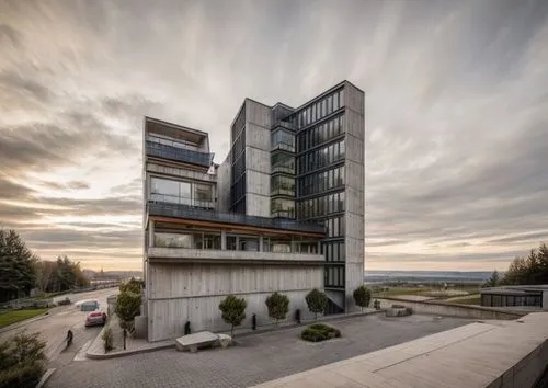 modern architecture,residential tower,glass facade,discovery park,modern building,metal cladding,new building,contemporary,biotechnology research institute,cubic house,exposed concrete,vancouver,bruta