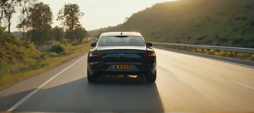 A car comes through highway. Straight road. Evening. Golden hour. Black car. High frame rate. Front view. Camera following. 4k. Super quality.,bmwi3,opel ampera,peugeot 3008,toyota rav4 ev,opel insign