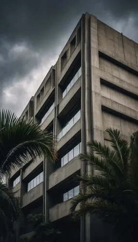 Brutalist building, Los Angeles cityscape, concrete structure, geometric shapes, rugged texture, urban landscape, overcast sky, dramatic lighting, low-angle shot, cinematic composition, modern art mus