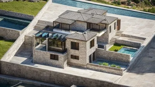 Small stone-cladded villas surrounded by stone-cladded boundary walls on a rural steep slope mountain with few trees ,luxury property,pool house,dunes house,luxury real estate,flat roof,roof landscape