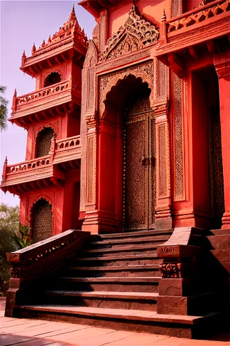 Hindu temple, Mandir, ancient architecture, intricate carvings, ornate details, towering structure, red stone walls, golden domes, stairs leading up, ornamental doors, morning sunlight, warm color ton