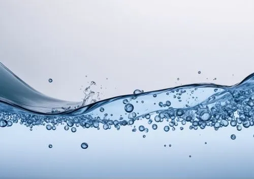 Picture of plain water slowly moving in front of a white background. daylight. Half under the water, half above the water. several small bubbles under the water,water splash,water splashes,splash wate