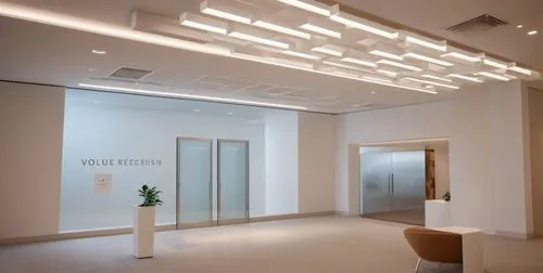 una recepción de un edificio con muebles elegantes ,the front room is clean and empty of people,phototherapeutics,periodontist,dentsu,assay office,biotherm,daylighting,Photography,General,Commercial