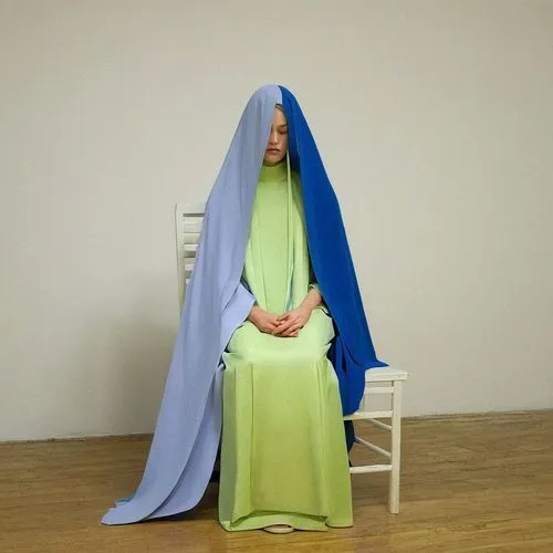 Waiting for her one true love sent by God despite past heartaches,praying woman,ron mueck,display dummy,artist's mannequin,the prophet mary,burqa,woman praying,dress form,the angel with the veronica v