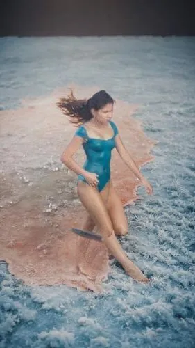 there is a female in a body of water,ondine,splash photography,flotation,lartigue,in water,naiad