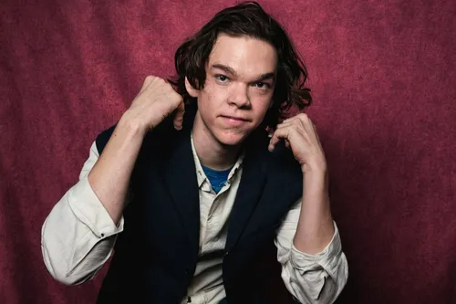 Slow West's Kodi Smit-McPhee photographed at The Hollywood Reporter photobooth at the 2015 Sundance Film Festival in Park City, Utah on Jan. 24, 2015.,bow tie,silk tie,benedict,vanity fair,daisy jazz 