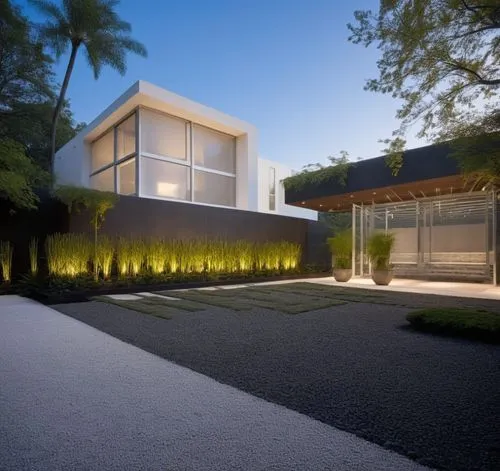 Diseño exterior de una casa moderna estilo minimalista combinando muros de color blanco con muros de tabique aparente, herrería de aluminio con cristal, fotografía hiperrealista, fotografía arquitectó