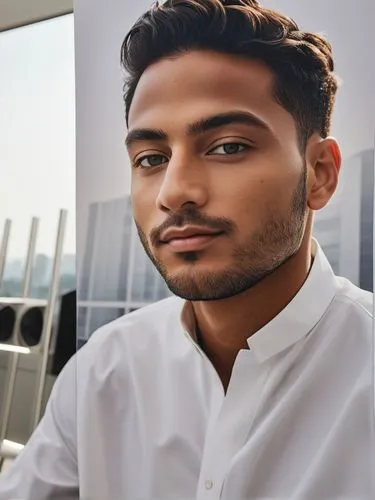 "Custom Poster Design to Elevate Your Brand",a male in a white shirt looks at the camera,pakistani boy,shakib,shahzaib,kunal,waqas,salhab,Photography,General,Realistic