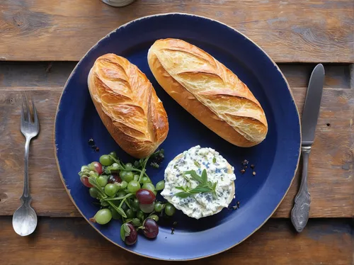 Transport your taste buds to a bustling French bistro, where a plate of Bresse Bleu cheese is served with warm baguette slices.,danish blue cheese,boursin cheese,tzatziki,blue cheese dressing,bresse b