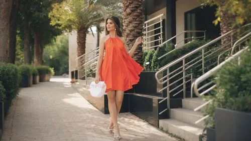 bright orange,girl in a long dress,woman walking,kifissia,fashion street,girl walking away